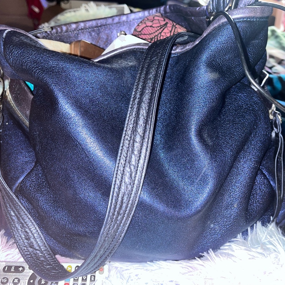 Blue purse roughy & tumble brand